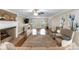 Inviting living room with a stone fireplace and hardwood floors at 2100 Davis Academy Rd, Rutledge, GA 30663