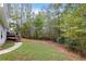 Landscaped backyard with firepit and deck at 84 Rainbow Ln, Hiram, GA 30141