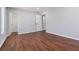 Spacious bedroom featuring wood-look floors and closet at 1825 Niskey Lake Rd, Atlanta, GA 30331