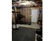 Unfinished basement with a home gym setup at 2332 Ewing Ne Dr, Atlanta, GA 30319