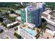 Aerial view of a modern high-rise building with a rooftop pool at 250 Pharr Ne Rd # 507, Atlanta, GA 30305