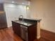 Kitchen island with granite countertop and stainless steel dishwasher at 250 Pharr Ne Rd # 507, Atlanta, GA 30305