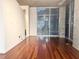 Spacious living room with hardwood floors and large windows at 250 Pharr Ne Rd # 507, Atlanta, GA 30305