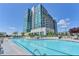 Resort-style pool with large deck and building view at 250 Pharr Ne Rd # 507, Atlanta, GA 30305