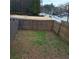 Small fenced backyard with patchy grass at 1801 Cumberland Valley Pl, Atlanta, GA 30080