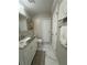 Clean bathroom with granite countertop and marble floor at 1801 Cumberland Valley Pl, Atlanta, GA 30080