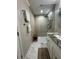 Updated bathroom with a walk-in shower and marble floors at 1801 Cumberland Valley Pl, Atlanta, GA 30080