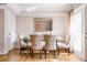 Elegant dining room with a glass table and patterned chairs at 1801 Cumberland Valley Pl, Atlanta, GA 30080