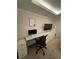 Modern home office with a glass desk and ergonomic chair at 1801 Cumberland Valley Pl, Atlanta, GA 30080