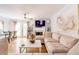 Bright living room featuring a sectional sofa and fireplace at 1801 Cumberland Valley Pl, Atlanta, GA 30080