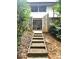 Wooden steps leading up to a private backyard patio at 2501 Bradford Sq, Atlanta, GA 30345