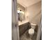 Modern bathroom with updated vanity, toilet and patterned floor at 2501 Bradford Sq, Atlanta, GA 30345