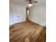 Spacious bedroom with hardwood floors and double door closet at 2501 Bradford Sq, Atlanta, GA 30345