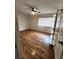 Bright bedroom with hardwood floors and ceiling fan at 2501 Bradford Sq, Atlanta, GA 30345