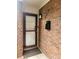 Front door entry with a mailbox and brick facade at 2501 Bradford Sq, Atlanta, GA 30345