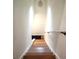 Clean, simple wooden staircase leading to the upper level at 2501 Bradford Sq, Atlanta, GA 30345