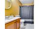 Bathroom with single vanity and shower/tub combo at 3447 Portsmouth Cir, Stonecrest, GA 30038