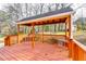 Spacious deck with a covered sitting area at 3447 Portsmouth Cir, Stonecrest, GA 30038