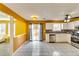 Kitchen with white cabinets, stainless steel appliances, and tile floors at 3447 Portsmouth Cir, Stonecrest, GA 30038