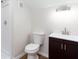 Bathroom with shower, toilet and dark vanity at 4100 Chanticleer Nw Dr, Kennesaw, GA 30152