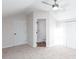 Bedroom with carpet, double doors, and an ensuite bathroom at 4100 Chanticleer Nw Dr, Kennesaw, GA 30152