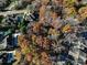 Aerial view of a wooded lot surrounded by upscale homes with pools at 5375 Northland Ne Dr, Sandy Springs, GA 30342