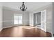 Bright dining room with hardwood floors and chandelier at 1105 Huntcrest Rdg, Mcdonough, GA 30252