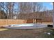 Above ground pool with surrounding decking and fence at 1105 Huntcrest Rdg, Mcdonough, GA 30252