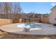 Kidney shaped pool with a diving board and gazebo at 1105 Huntcrest Rdg, Mcdonough, GA 30252