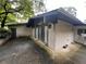 Mid-century modern home with brick exterior and large windows at 2323 Valleyside Dr, Decatur, GA 30032