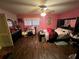 Main bedroom with a walk-in closet and dark wood flooring at 2323 Valleyside Dr, Decatur, GA 30032