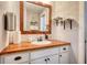 Clean bathroom with wood countertop and built-in shelves at 134 N Johnson N St, Newborn, GA 30056