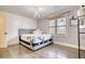 Bedroom with hardwood floors, shiplap walls and a bed at 134 N Johnson N St, Newborn, GA 30056