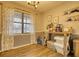 Bright dining area with hardwood floors and window seating at 134 N Johnson N St, Newborn, GA 30056