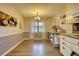 Charming dining area with hardwood floors and farmhouse decor at 134 N Johnson N St, Newborn, GA 30056