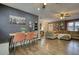 Farmhouse-style dining area with wood table at 134 N Johnson N St, Newborn, GA 30056