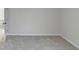 Bright bedroom with neutral walls and carpet, offering a door to hallway at 1924 Wilkenson Xing, Marietta, GA 30066