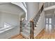 Two-story entryway with hardwood floors and staircase at 1924 Wilkenson Xing, Marietta, GA 30066