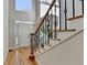 Two-story entryway with hardwood floors and elegant staircase at 1924 Wilkenson Xing, Marietta, GA 30066