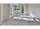 Bright living room with bay window and carpet flooring at 1924 Wilkenson Xing, Marietta, GA 30066