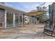 Enjoy outdoor living on this wooden back deck with rocking chairs and stylish sunshade umbrella at 3413 Canadian Way, Tucker, GA 30084