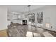 Dining area featuring sliding glass doors, a modern light fixture, and brand new flooring at 3413 Canadian Way, Tucker, GA 30084