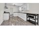 Bright kitchen featuring white cabinetry, stainless steel appliances, and modern countertops at 3413 Canadian Way, Tucker, GA 30084