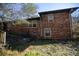 Brick house exterior showcasing back side and landscaping at 1351 Harbin Rd, Atlanta, GA 30311