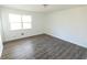 Well-lit bedroom with wood-look flooring at 2761 Rockdale, Decatur, GA 30034