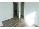 Spacious bedroom with wood-look floors and closet at 2761 Rockdale, Decatur, GA 30034