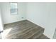 Bright bedroom featuring wood-look flooring at 2761 Rockdale, Decatur, GA 30034