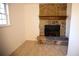 Living room with stone fireplace and tile floors at 2761 Rockdale, Decatur, GA 30034