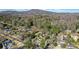 Aerial view of neighborhood with mountain views at 390 Cascade Nw Dr, Marietta, GA 30064