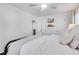 Well-lit bedroom with a rustic dresser and built-in shelves at 390 Cascade Nw Dr, Marietta, GA 30064